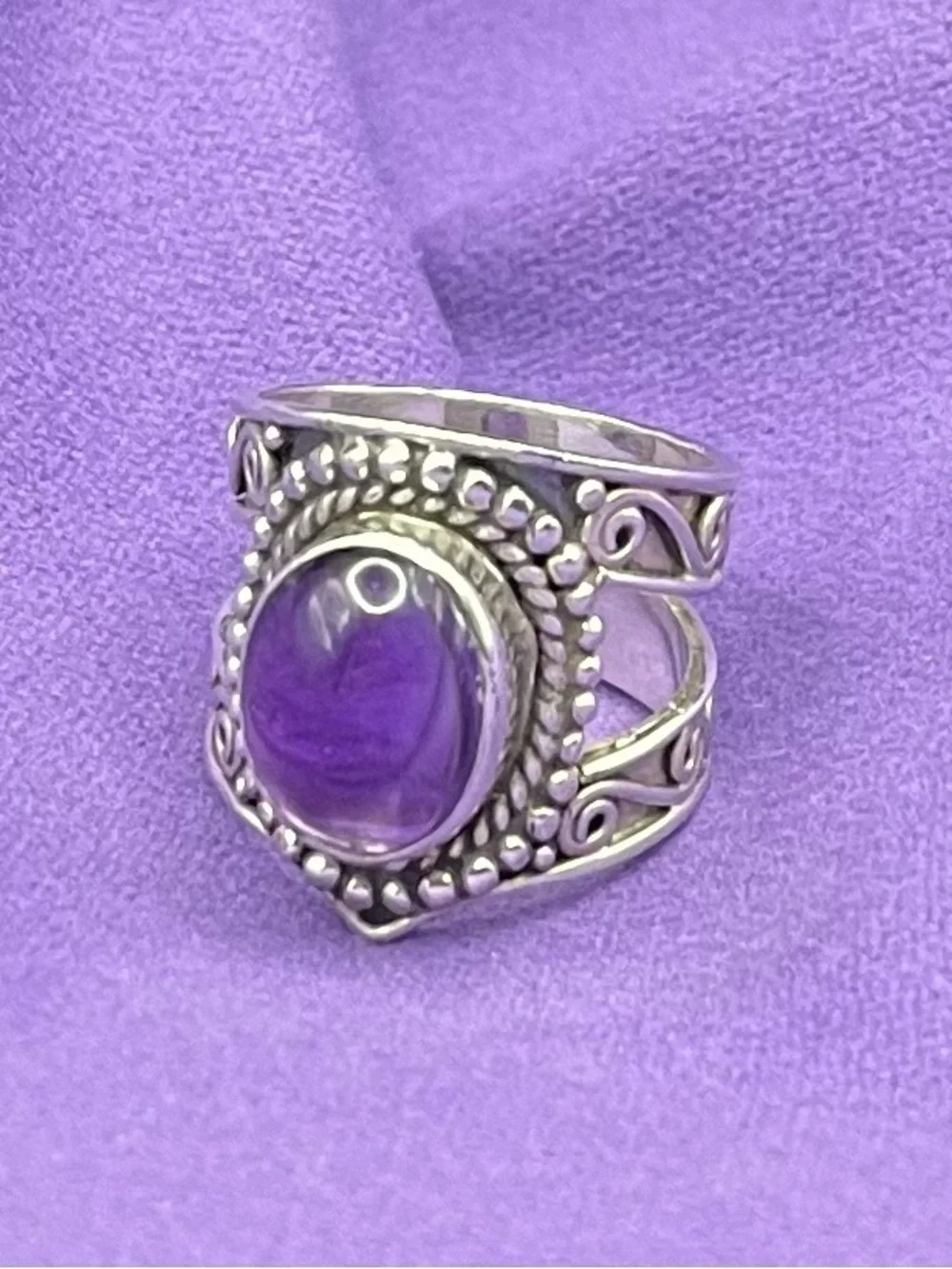 Vtg  SS  oval, amethyst statement, ring size 7 Boho wide band.   8.34  grams
